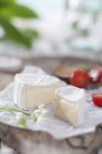 Sliced soft cheese — Stock Photo