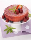 Cold berry cake on stand — Stock Photo