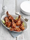 Spicy chicken drumsticks with lime — Stock Photo