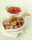 Cold meatballs with sauce — Stock Photo