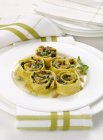 Gratinated pasta rolls with fresh herbs — Stock Photo