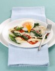 Lasagne pasta bake with fried egg — Stock Photo