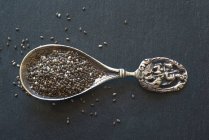 Chia seeds on old antique spoon — Stock Photo