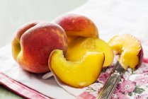 Fresh Peaches with slices — Stock Photo