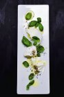 Mozzarella with basil on plate — Stock Photo
