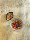 Muesli with Red pepper, pistachios and raspberries — Stock Photo