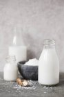 Bouteilles de lait de coco — Photo de stock