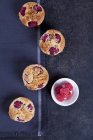 Closeup top view of raspberry financiers with coconut — Stock Photo