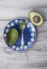 Scooped out avocado half — Stock Photo