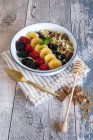 Muesli with yoghurt, berries and fruits — Stock Photo