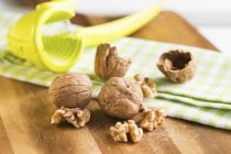 Walnuts with Nut Crackers — Stock Photo