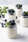 Rice pudding with blueberries — Stock Photo