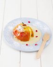Baked apple with vanilla — Stock Photo