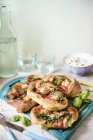 Pizza rolls with spinach — Stock Photo