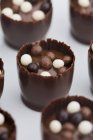 Chocolate truffles with balls — Stock Photo