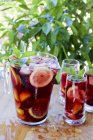 Sangria in a pitcher and in glasses — Stock Photo