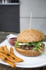Burger with sweet potato chips — Stock Photo