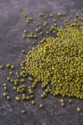 Scattered mung beans — Stock Photo