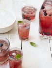 Closeup view of refreshing drinks with berries — Stock Photo