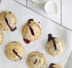 Small pies with berry filling — Stock Photo
