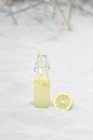 Bottle of fresh lemonade — Stock Photo