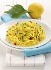 Linguine pasta with lemon and herbs — Stock Photo