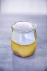 Closeup view of lemon cream in a glass — Stock Photo