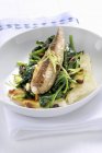 Italian dish of mackerel and spinach — Stock Photo