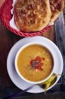 Lentil soup with unleavened bread — Stock Photo