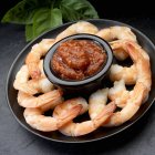 Boiled prawns with seafood dip — Stock Photo