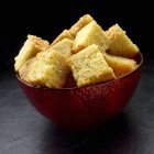 Cornbread cut into cubes — Stock Photo