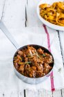 Wild boar ragout and Pappardelle pasta — Stock Photo