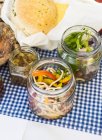Picnic dishes set in jars — Stock Photo