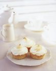 Cupcakes with a meringue topping — Stock Photo