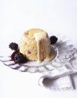 Steamed pudding with blackberries — Stock Photo