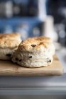 Scones on wooden board — Stock Photo
