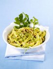Garganelli pasta with courgette and nuts — Stock Photo