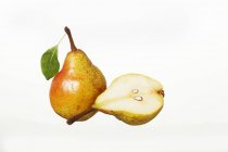 Fresh Williams pear with half — Stock Photo