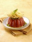 Tagliolini pasta on tomato jelly — Stock Photo
