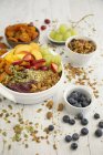 Muesli with acai berries, almonds and fruits — Stock Photo