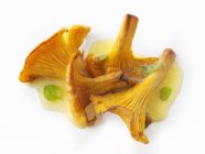 Chanterelle mushrooms in butter — Stock Photo