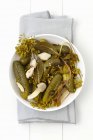 Pickled Gherkins with dill and basil — Stock Photo