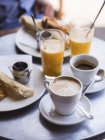 Elevated view of French breakfast served on cafe table — Stock Photo