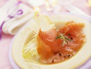 Smoked salmon and fancy chicory leaves — Stock Photo