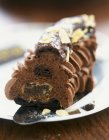 Closeup view of chocolate Saint-Honore with almonds on server — Stock Photo