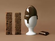 Melting chocolate egg — Stock Photo