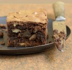 Brownie with walnuts serving — Stock Photo