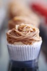 Cupcake with chestnut icing — Stock Photo