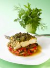 Piece of sea bass with herb crust — Stock Photo