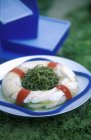 Cod fish in an aspic life ring with glasswort — Stock Photo